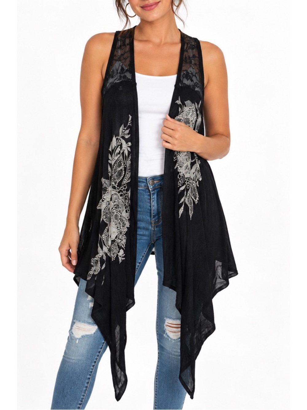 Vocal black sleeveless shawl/vest featuring delicate lace detailing, small